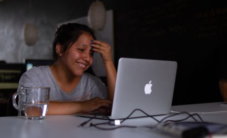 lady interacting with a laptop